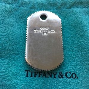 SOLD. Tiffany & co coin edge dog tag